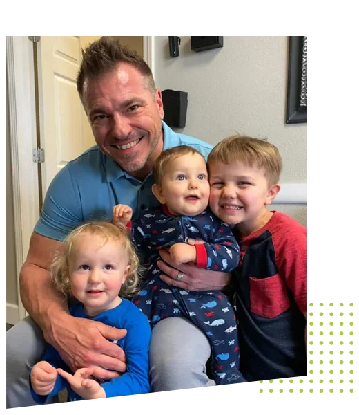 Dr. Justin Ashlock, the chiropractor at Ashlock Chiropractic, with pediatric patients